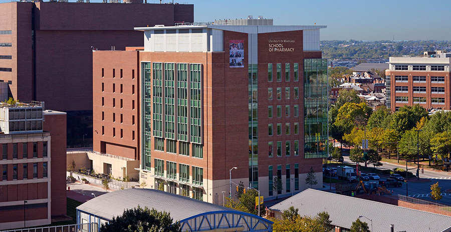 Pharmacy Hall with a 7 story building with a modern brick exterior